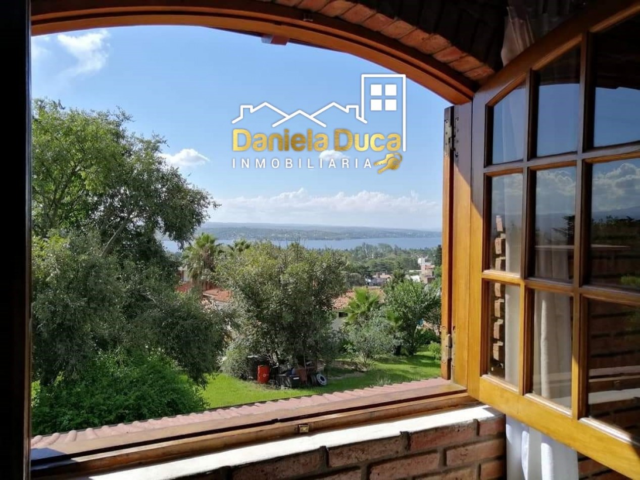 EN VENTA  CASA DE CATEGORIA EN CARLOS PAZ- LA CUESTA